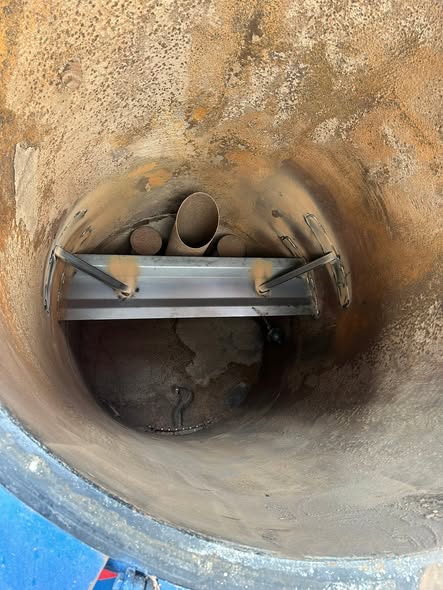 Interior of a tank showing a newly welded baffle and bracing